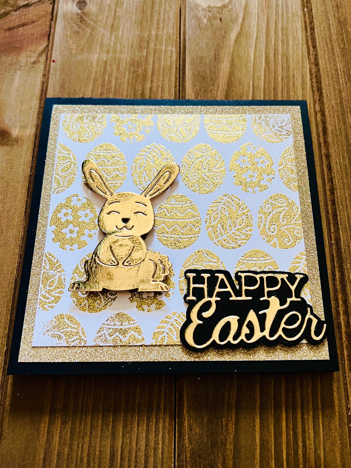 Golden Wobbler Rabbit Easter Greeting Card - A Shimmering Holiday Wish with Playful Bunny Design for Spring Celebrations