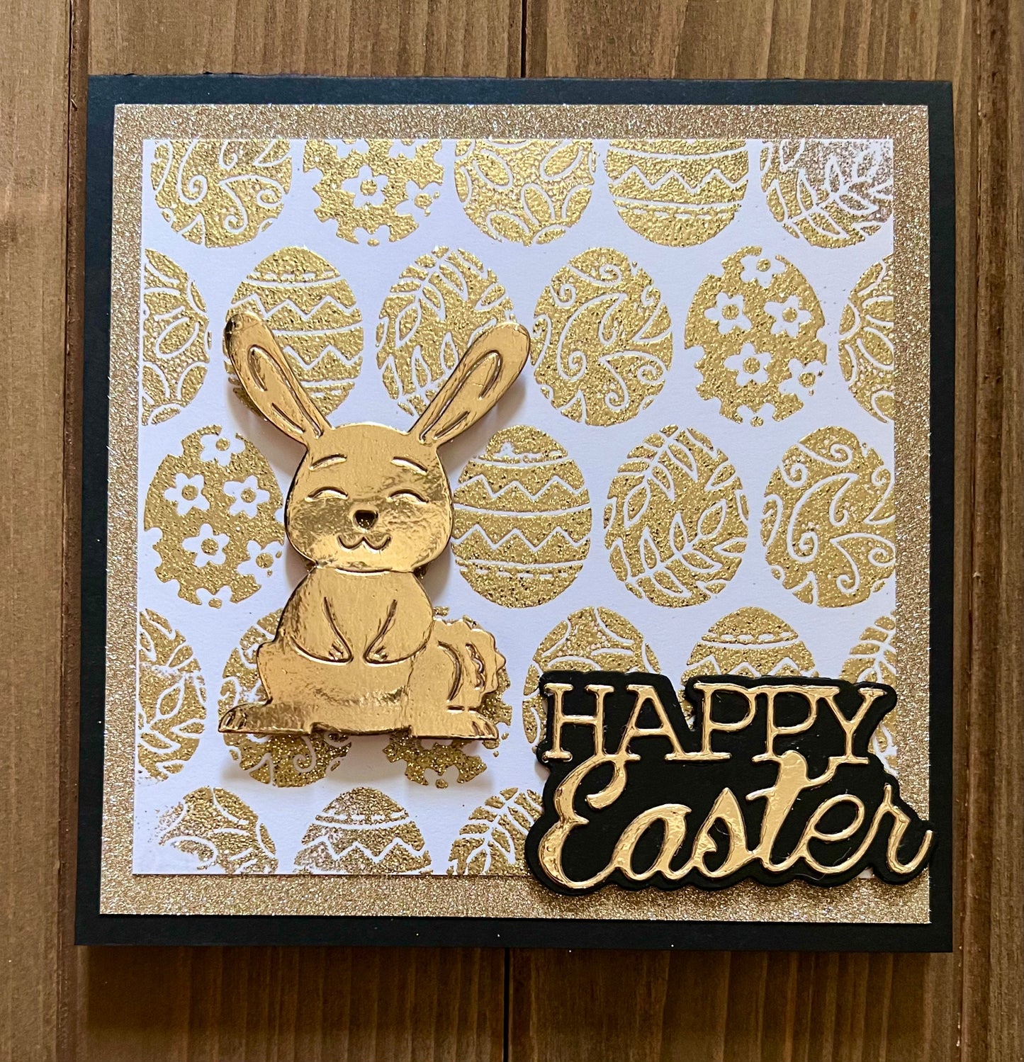 Golden Wobbler Rabbit Easter Greeting Card - A Shimmering Holiday Wish with Playful Bunny Design for Spring Celebrations