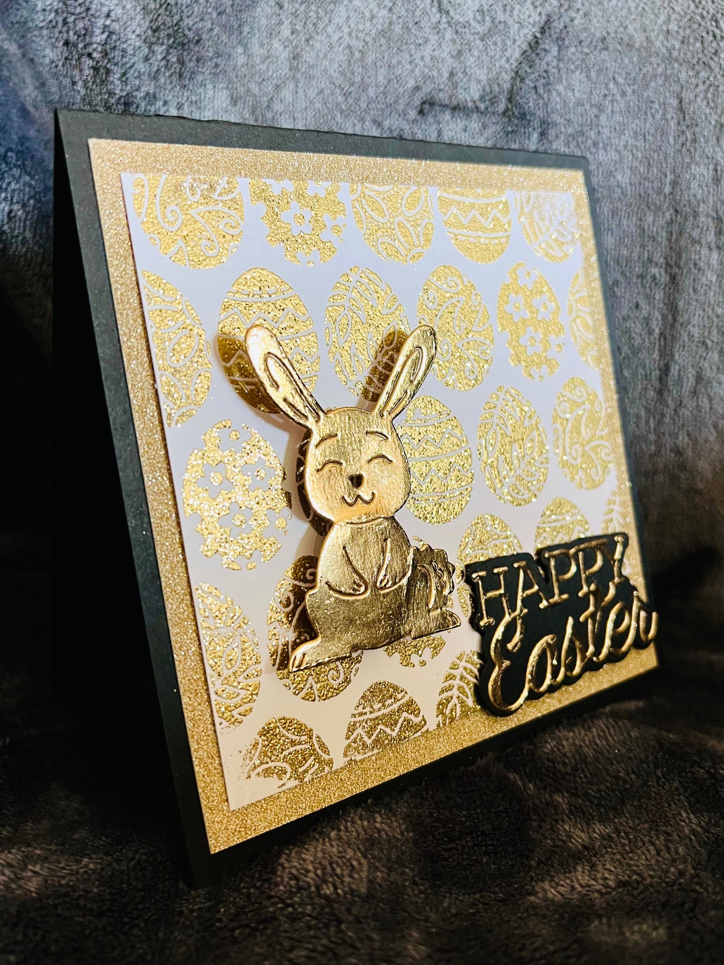 Golden Wobbler Rabbit Easter Greeting Card - A Shimmering Holiday Wish with Playful Bunny Design for Spring Celebrations