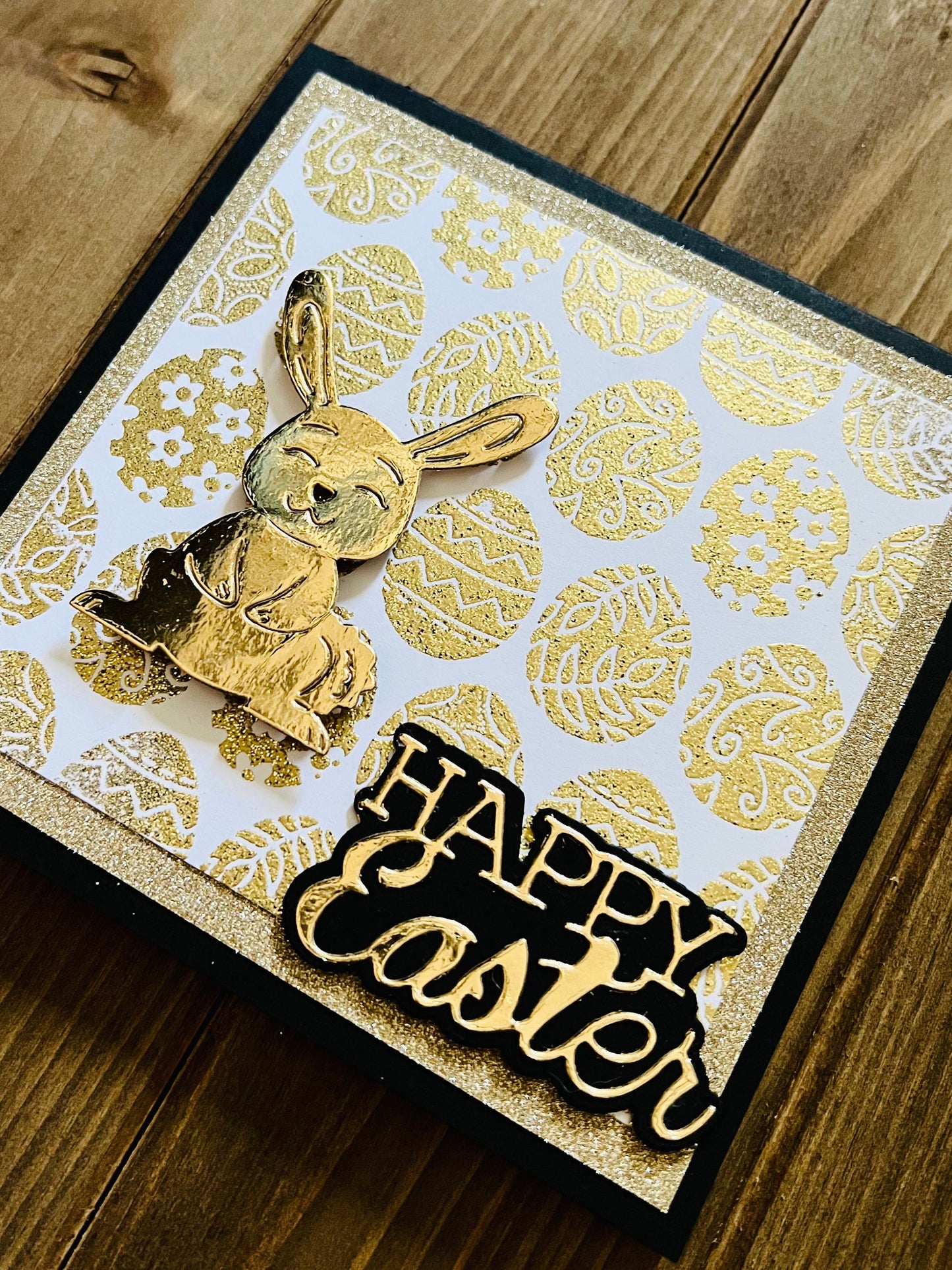 Golden Wobbler Rabbit Easter Greeting Card - A Shimmering Holiday Wish with Playful Bunny Design for Spring Celebrations