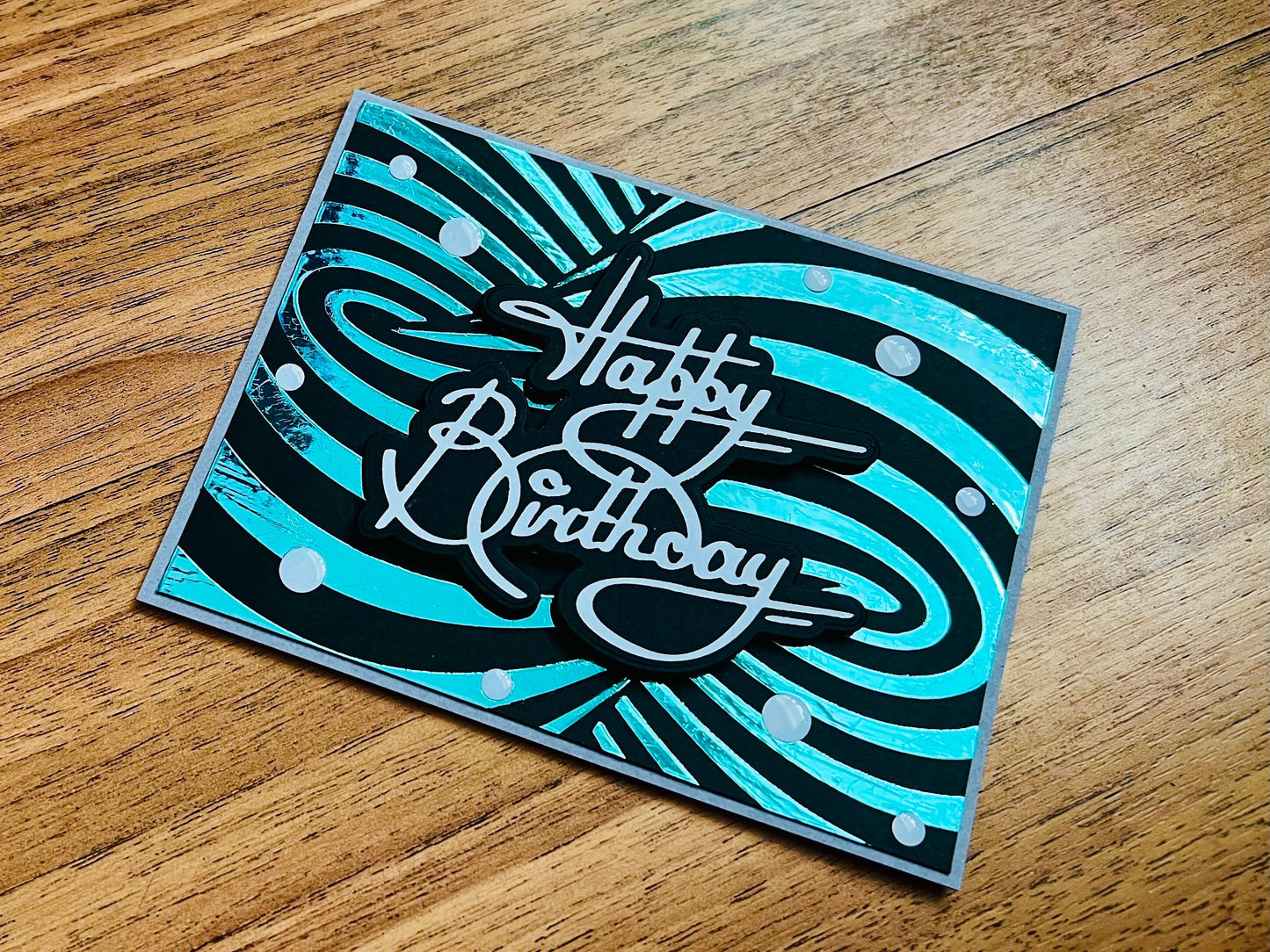 Aqua Foiled Twisted Illusion Birthday Card (Black Blgrd.)