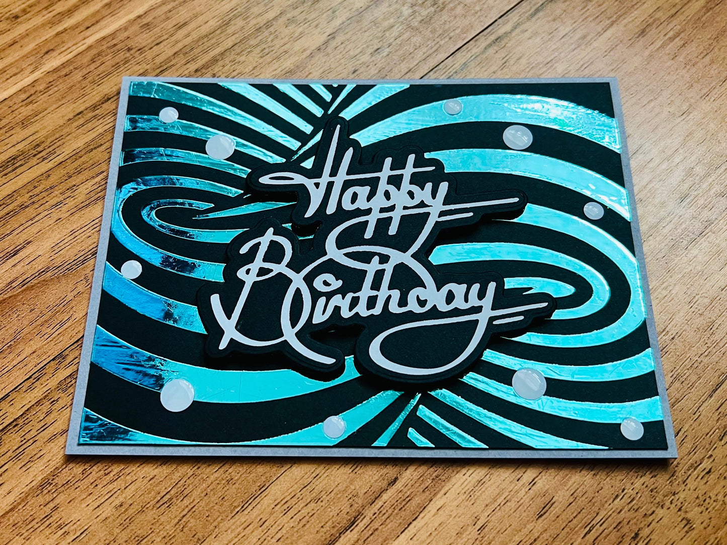 Aqua Foiled Twisted Illusion Birthday Card (Black Blgrd.)