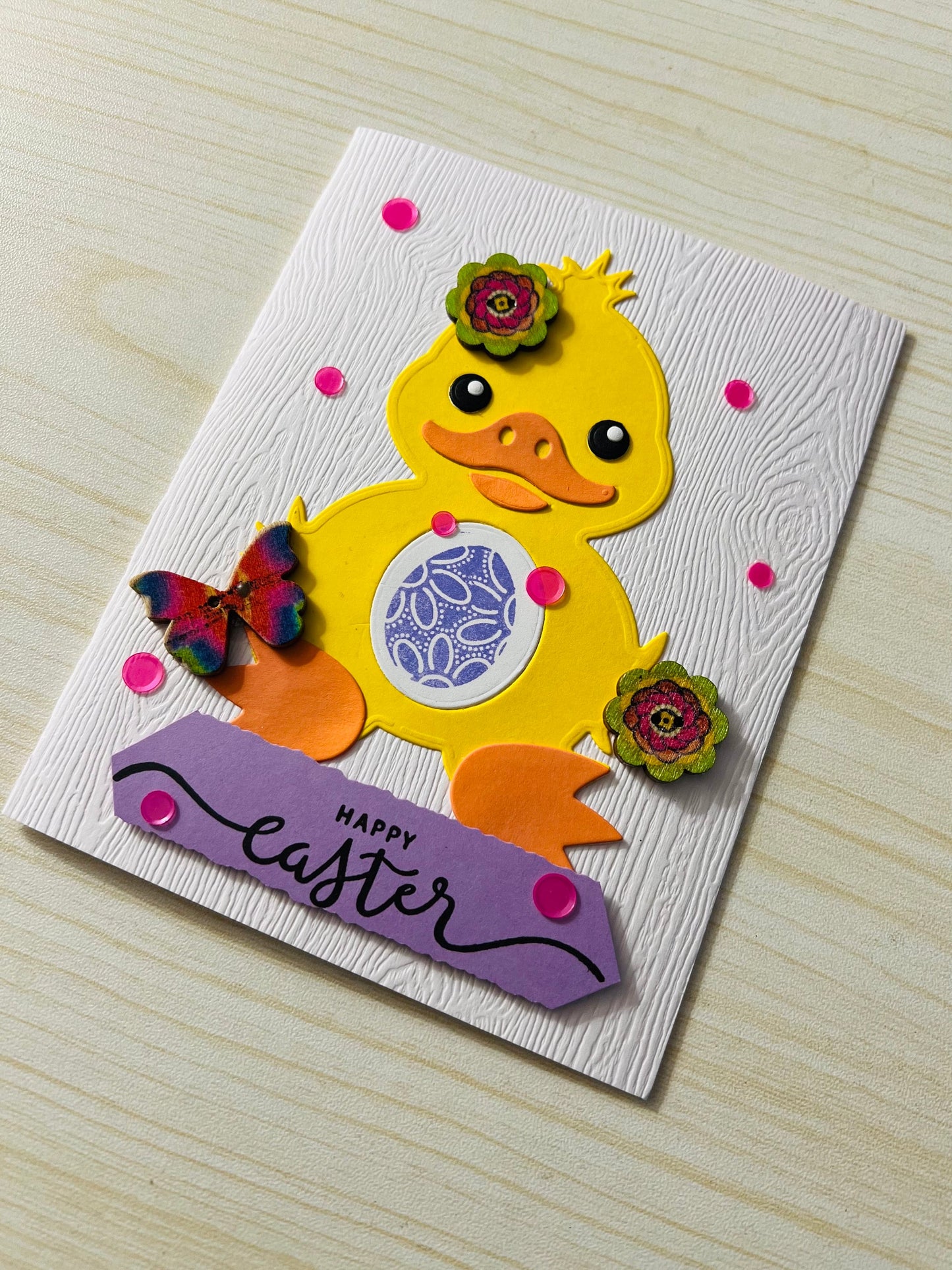Easter Ducky Card with Wooden Floral and Butterfly Button Accents - A Charming Greeting of Spring Renewal