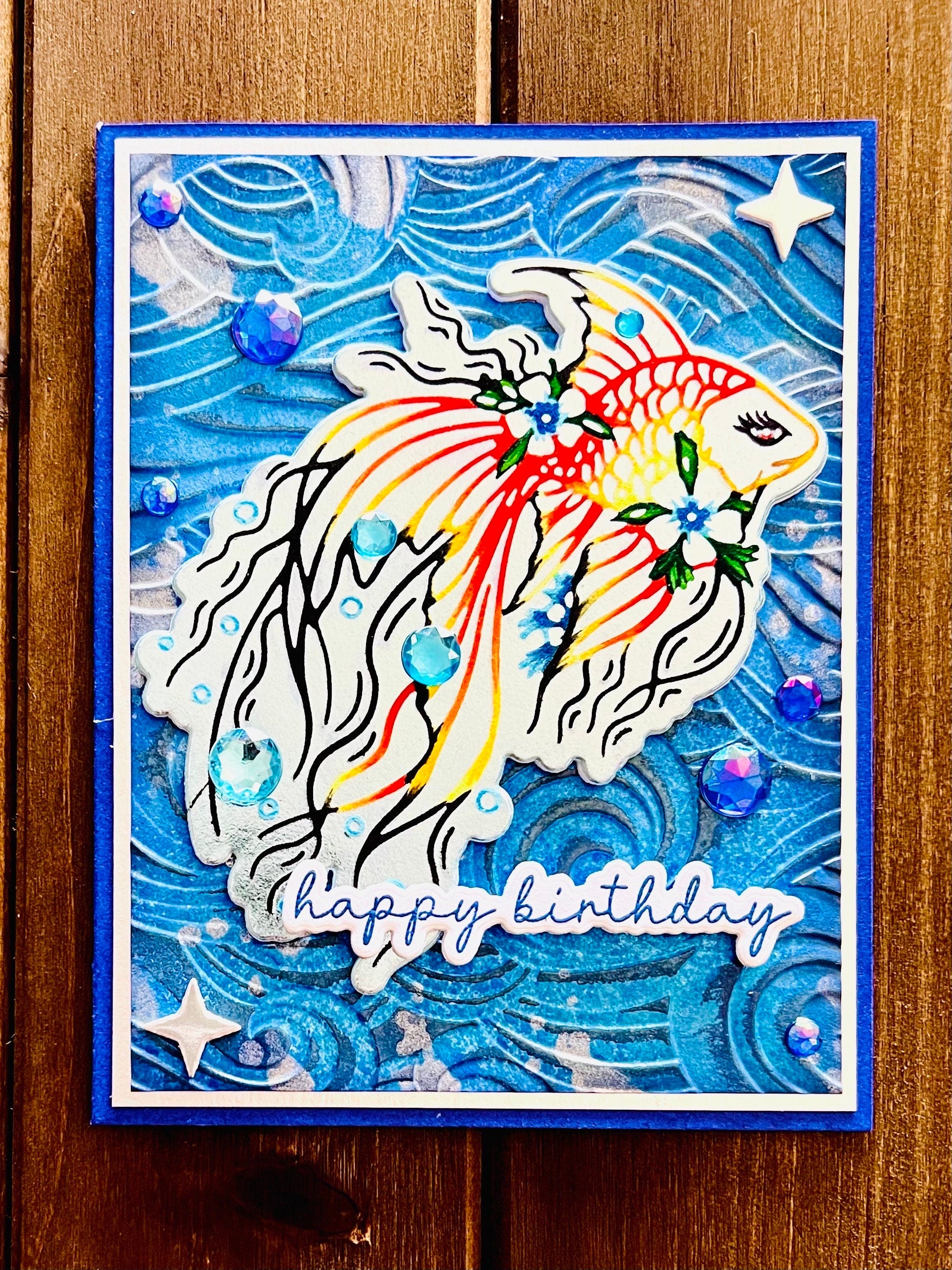 Outlined Orange and Yellow Betta Fish with Wave Background Birthday Card