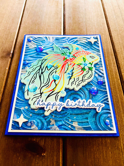 Outlined Orange and Yellow Betta Fish with Wave Background Birthday Card