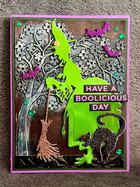 Green Silhouette Witch with Cat and Bats and Floral Tree Halloween Card