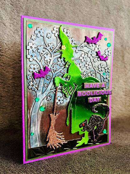 Green Silhouette Witch with Cat and Bats and Floral Tree Halloween Card
