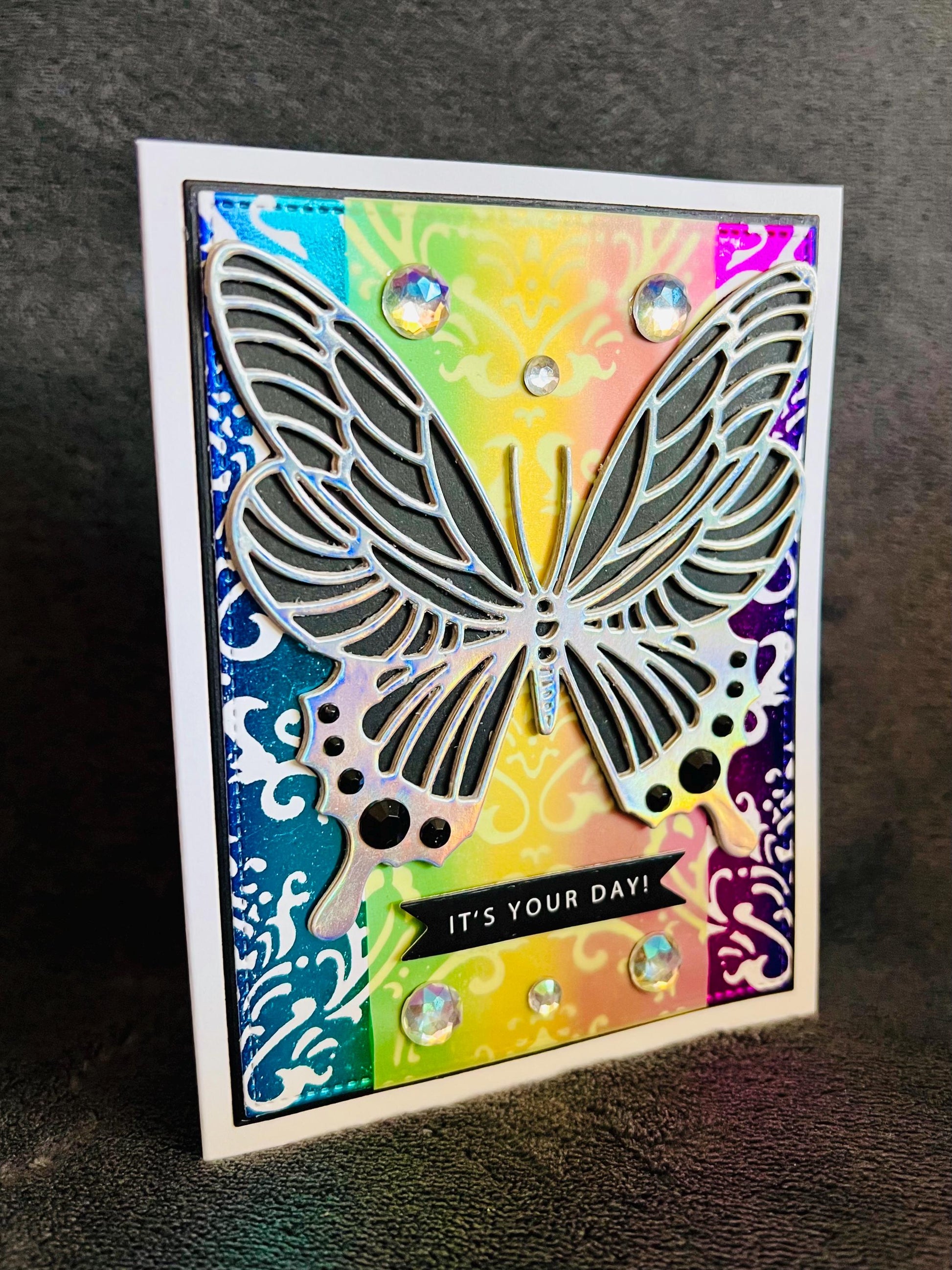Silver Butterfly on Foiled Rainbow Damask Background It’s Your Day Card