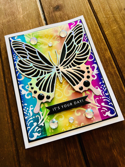 Silver Butterfly on Foiled Rainbow Damask Background It’s Your Day Card