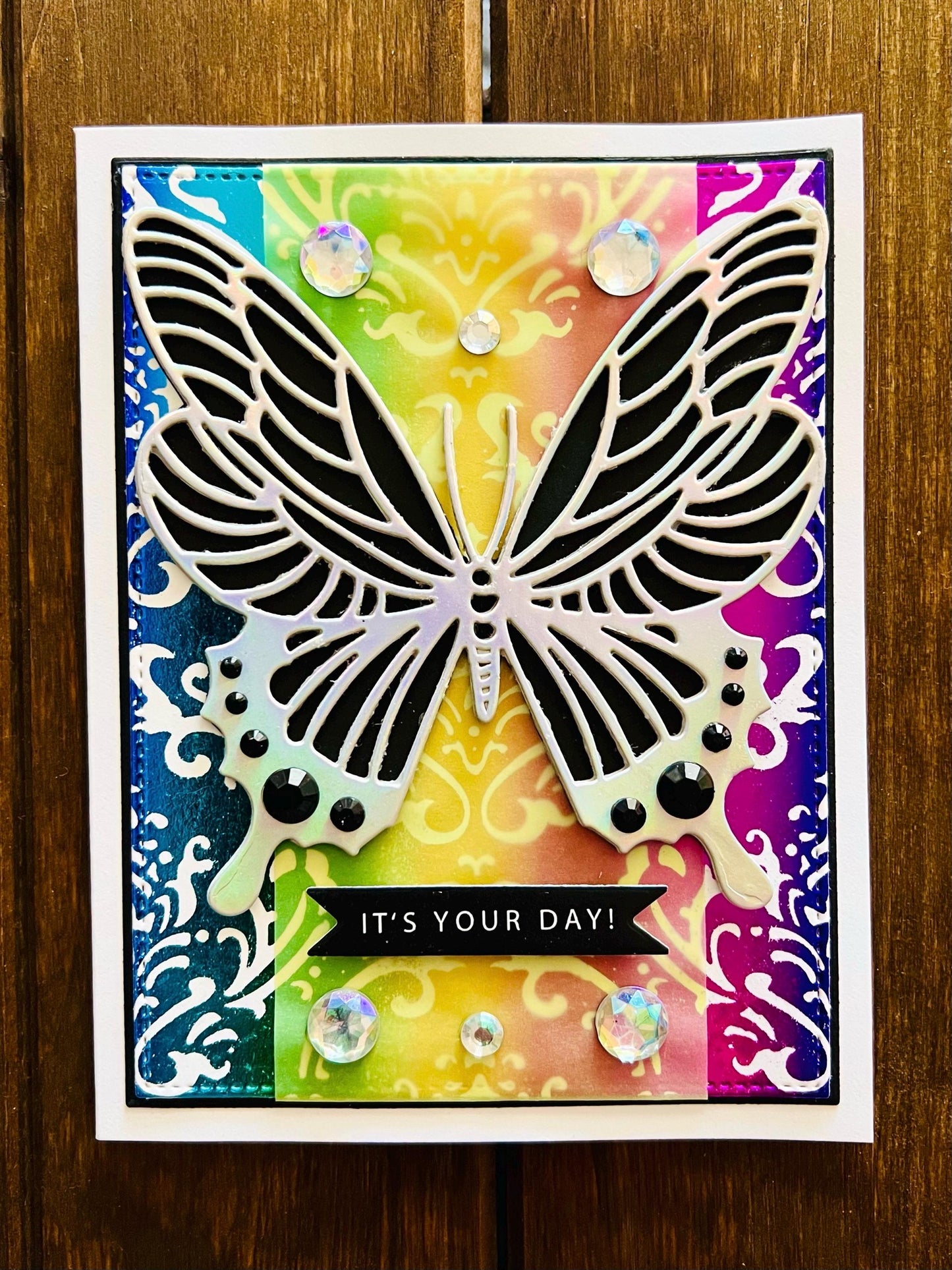 Silver Butterfly on Foiled Rainbow Damask Background It’s Your Day Card