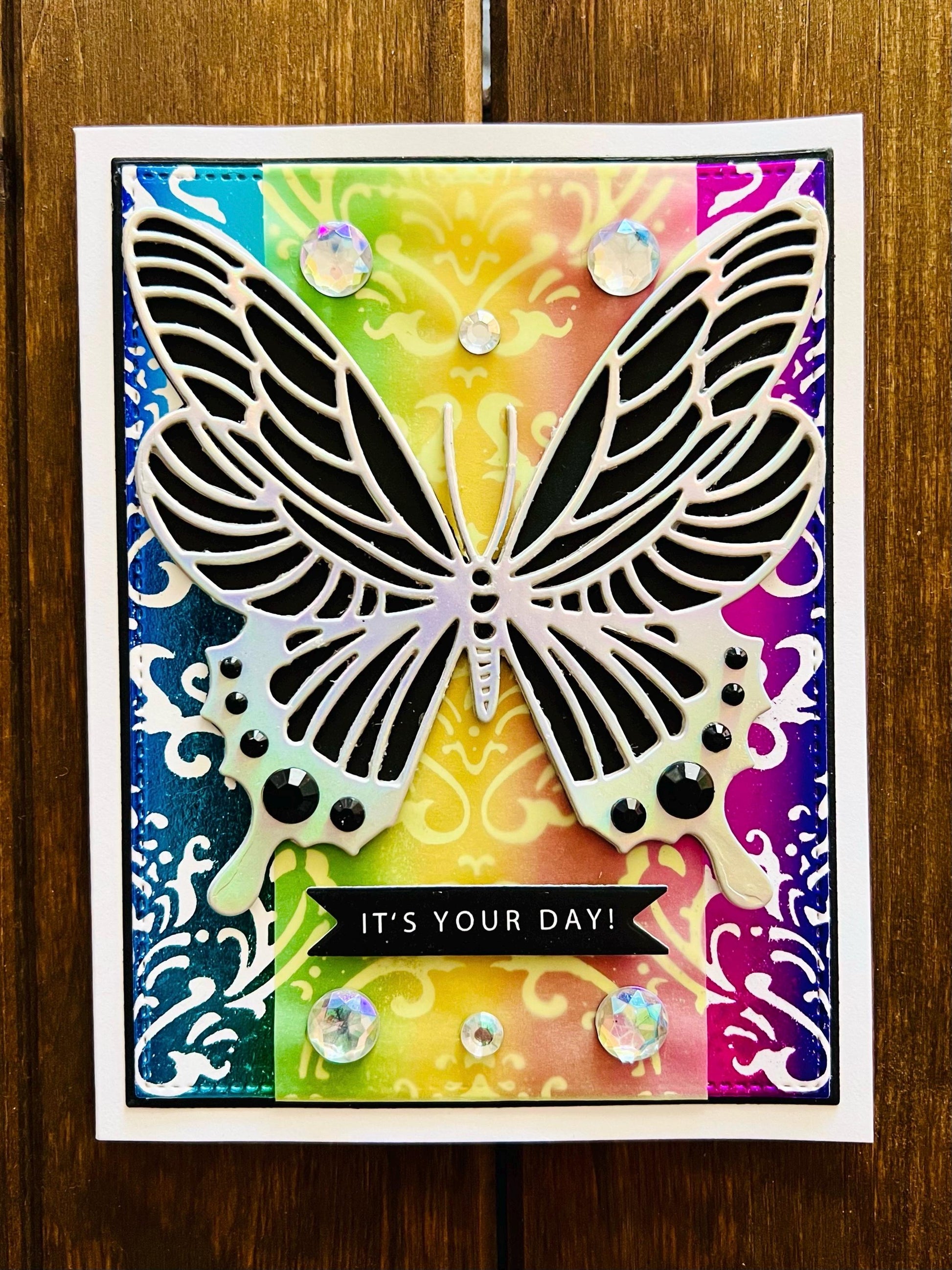 Silver Butterfly on Foiled Rainbow Damask Background It’s Your Day Card