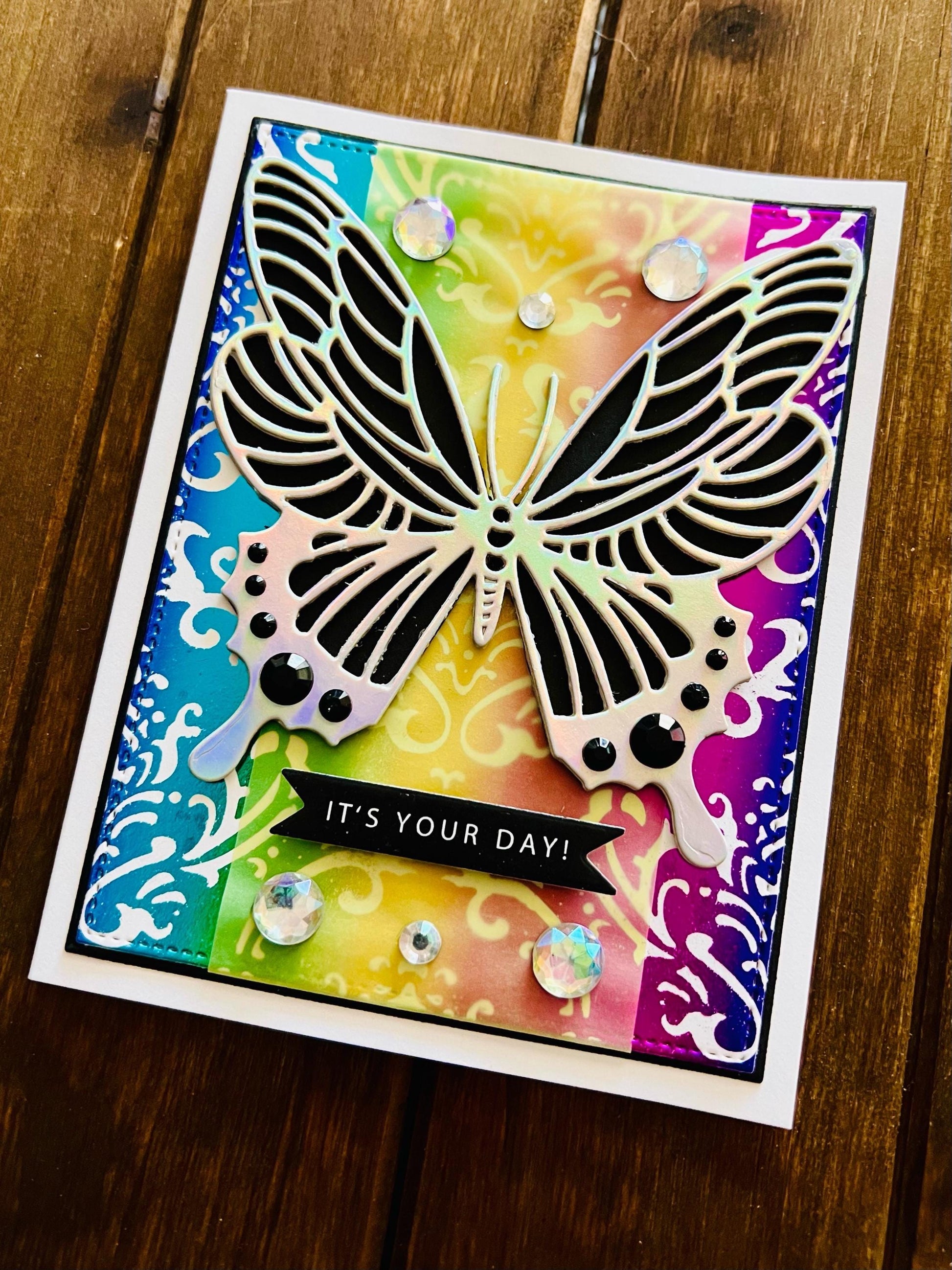 Silver Butterfly on Foiled Rainbow Damask Background It’s Your Day Card