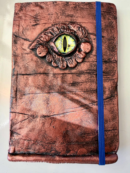 Handmade decorative Dragon Eye on a hardcover journal measuring 8.25"x5.5"x1"