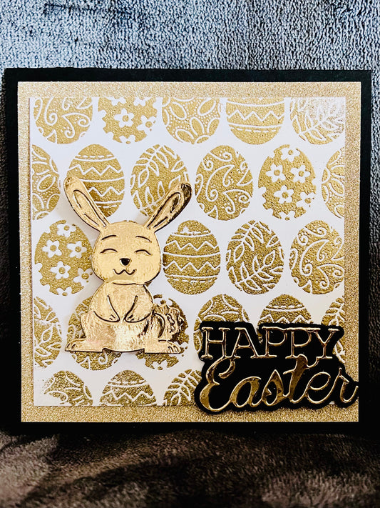 Golden Wobbler Rabbit Easter Greeting Card - A Shimmering Holiday Wish with Playful Bunny Design for Spring Celebrations